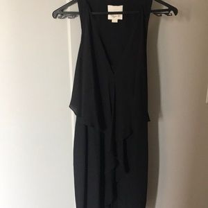 Arya K black mini dress with front ruffle